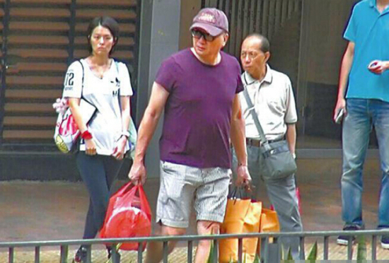 湯鎮業發福照片